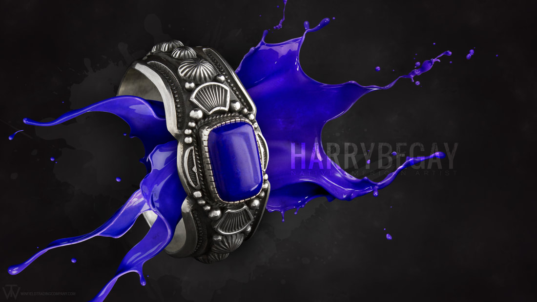A fun photo of this Beautiful piece by Harry Begay. This bracelet is crafted from a piece Silver Ingot! Completely shaped and stamped full of details then handmade beads and designs placed on top. Not to mention the pretty Lapis!